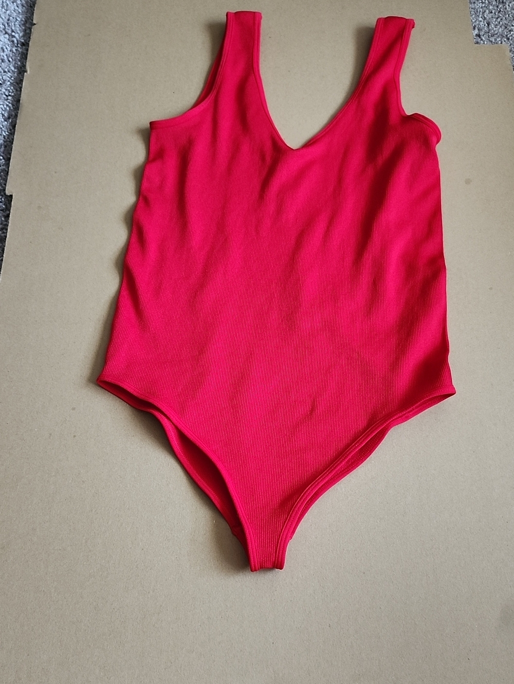 Sleeveless Red One-Piece Bodysuit